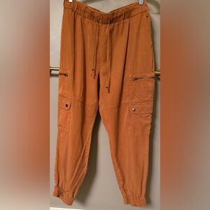 Fall Calling! And you’re ready with these refined brandy cargo pants.